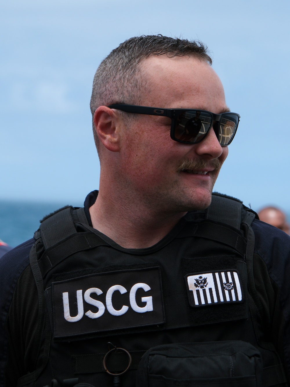 Coast Guard Cutter Northland personnel conduct fisheries boarding in the Atlantic Ocean