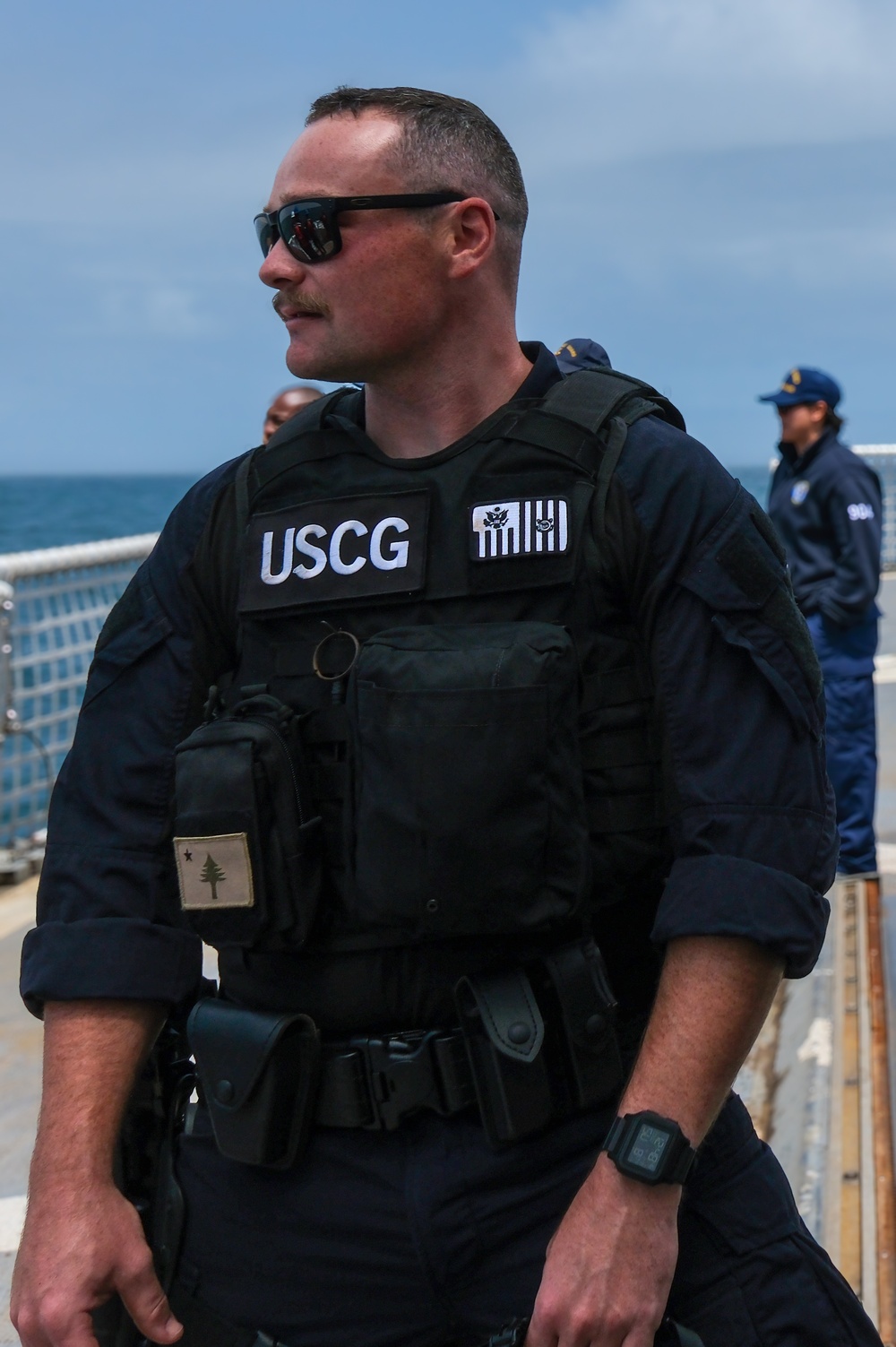 Coast Guard Cutter Northland personnel conduct fisheries boarding in the Atlantic Ocean