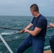 Coast Guard Cutter Northland personnel conduct fisheries boarding in the Atlantic Ocean