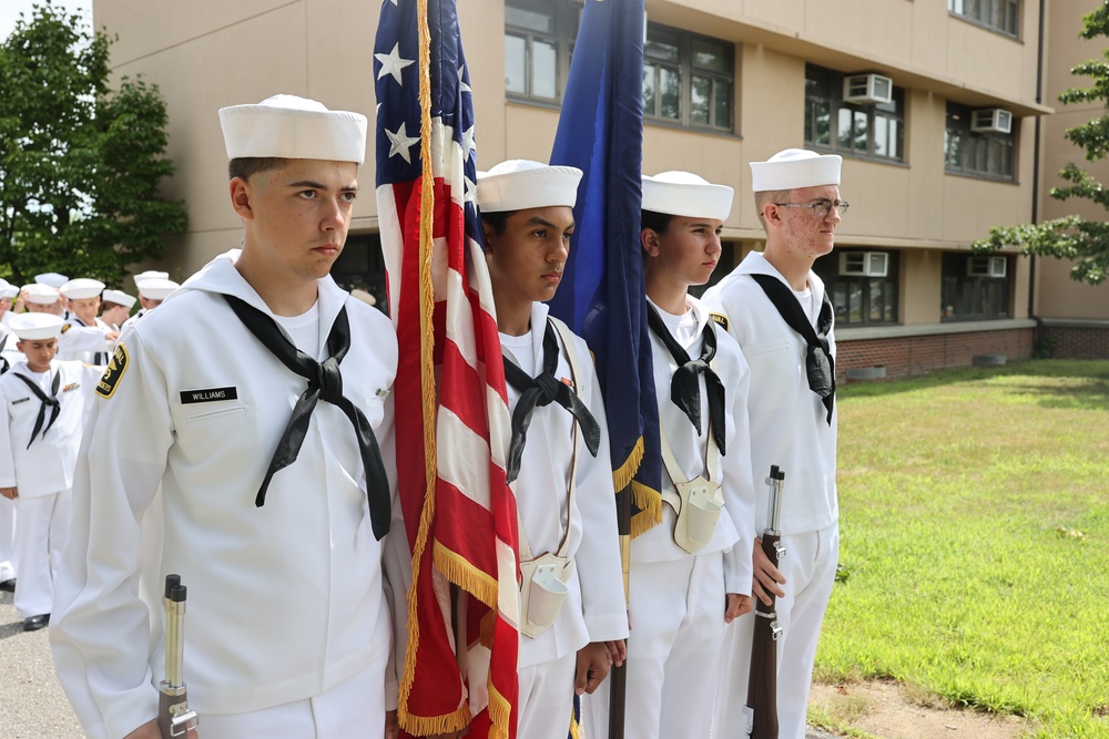 Sea Cadet color guard stands ready