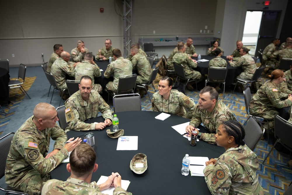 Senior Army and Air Force enlisted leaders participate in a speed mentoring event during the Joint Enlisted Leadership Conference running in Detroit, MI