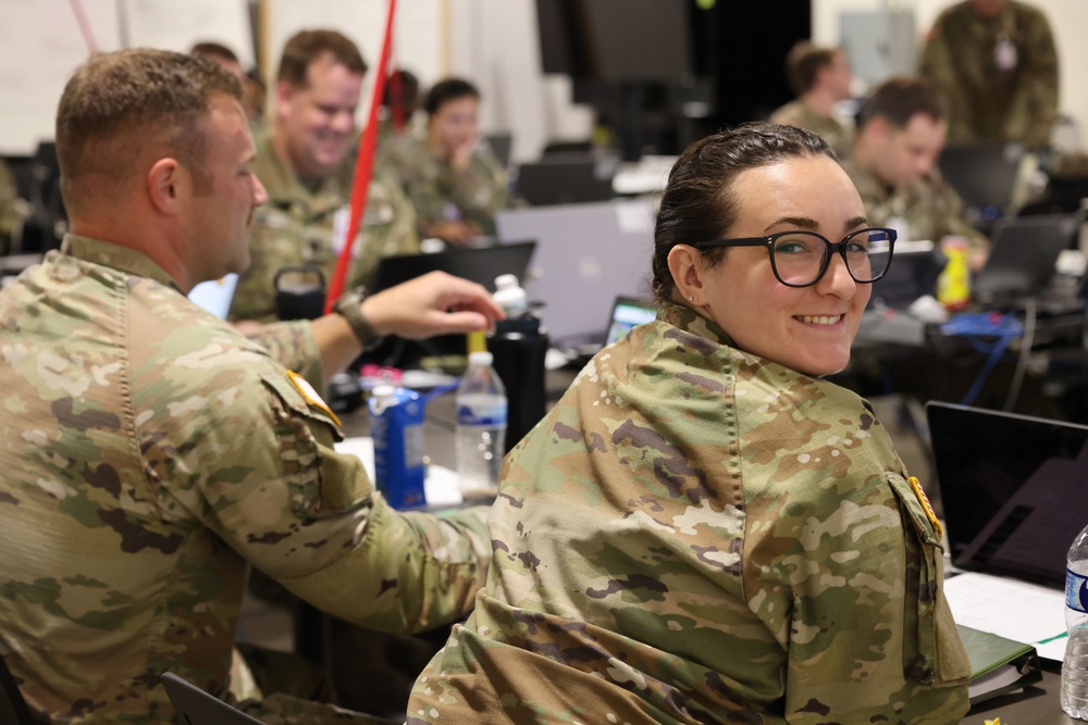 Soldiers from the 244th ECAB conduct planning operations