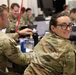 Soldiers from the 244th ECAB conduct planning operations