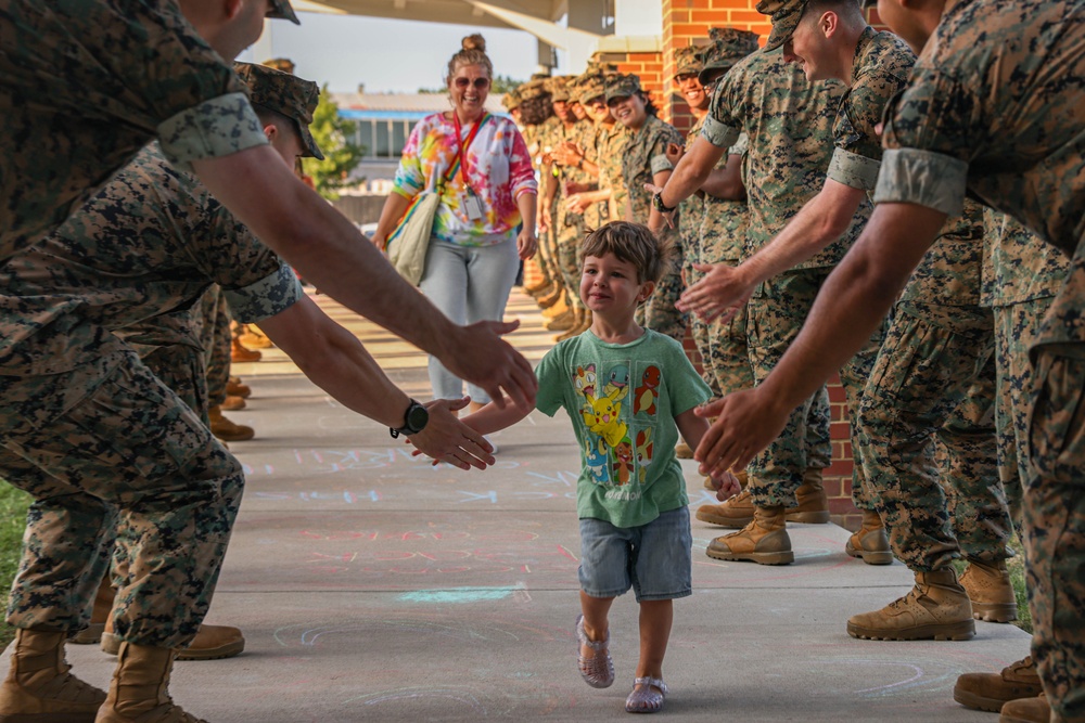 U.S. Marines welcome students back to school