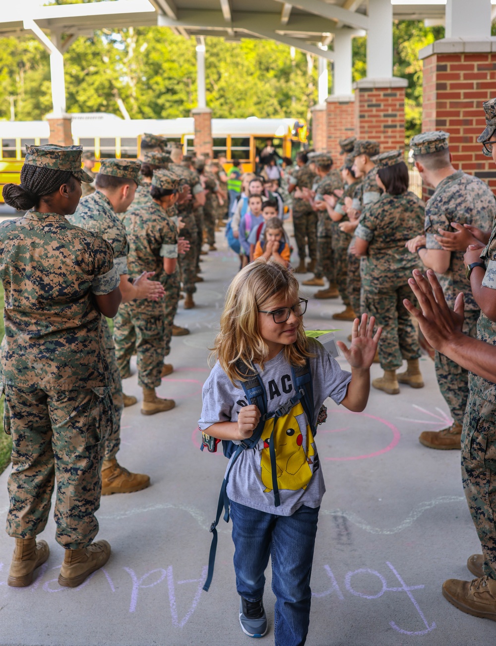 U.S. Marines welcome students back to school