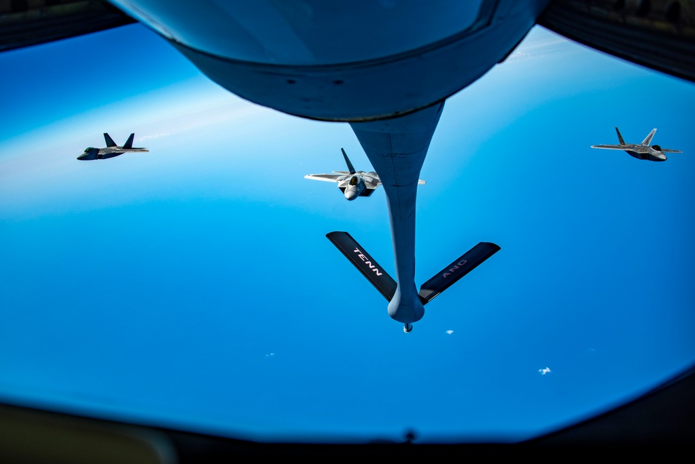 KC-135 Stratotanker refueling F-22 Raptors