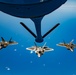 KC-135 Stratotanker refueling F-22 Raptors