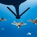 KC-135 Stratotanker refueling F-22 Raptors