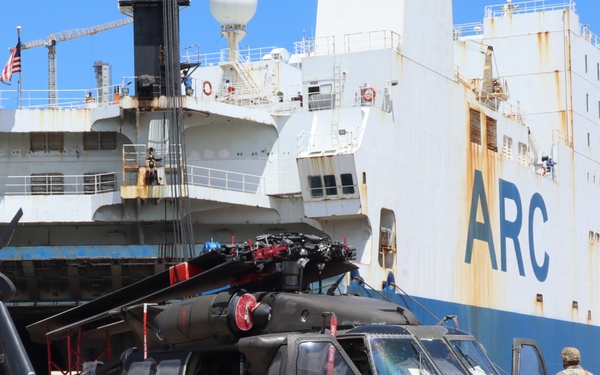 Joint Forces: Army Transporters and Navy Sailors train together at port