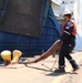 A contractor ties down the vessel during Turbo Distribution 24-4.