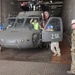 Soldiers assigned to the 1st Infantry Division Combat Aviation Brigade (CAB) unload their aircraft from aboard a commercial cargo vessel at the Port of Corpus Christi, Texas, Aug. 13.