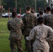 Marines with Marine Corps Combat Service Support Schools maneuver through an obstacle course