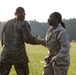 Marines with Marine Corps Combat Service Support Schools maneuver through an obstacle course