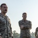 Marines with Marine Corps Combat Service Support Schools maneuver through an obstacle course