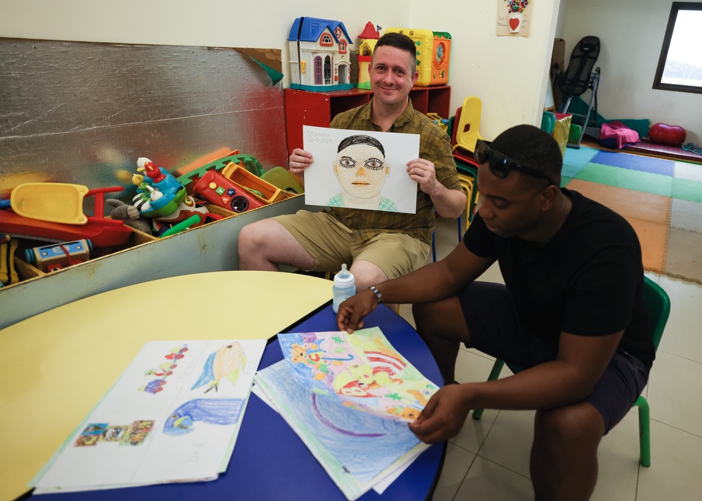 TF 51/5 Marines and Sailors volunteer at Regional Institute for Active Learning