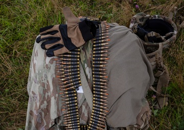 U.S. Army National Guard soldiers fire M249s at the 2024 National Best Warrior Competition