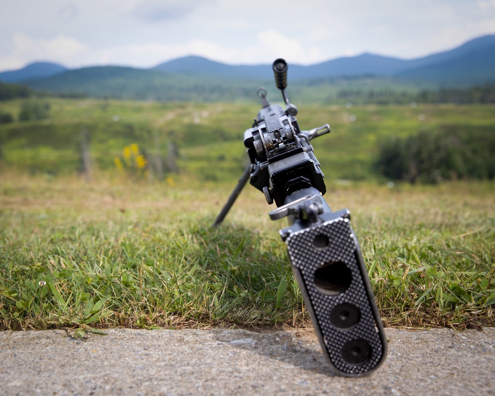 U.S. Army National Guard soldiers fire M249s at the 2024 National Best Warrior Competition