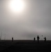 110th EBS Airmen make the best of a foggy morning