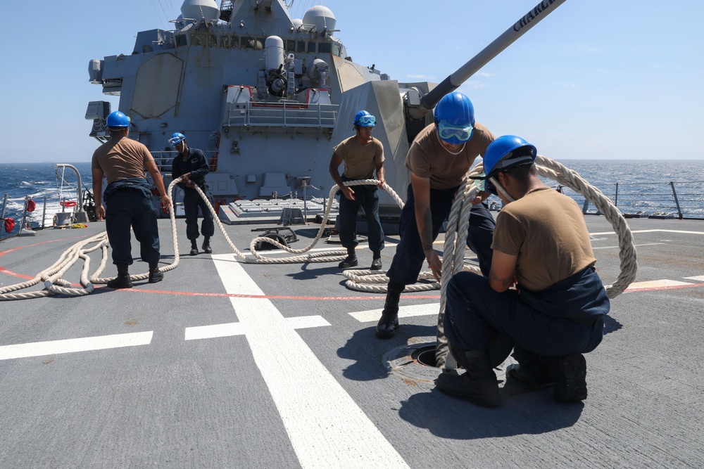 Sailors aboard the USS Howard conduct a sea and anchor detail in Yokosuka, Japan