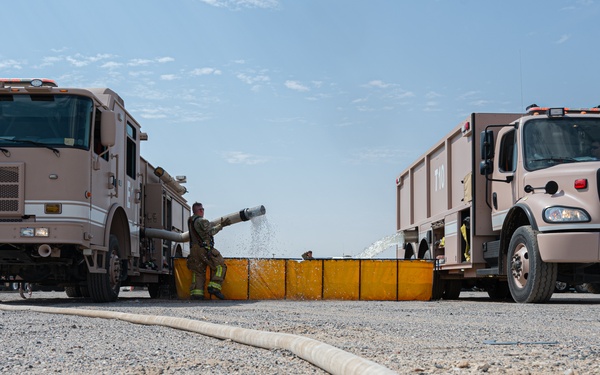 386th ECES firefighters and host nation participate in joint coalition exercise