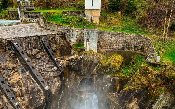 Pfaffensprung sediment bypass tunnel is visible from above the dam and outlet