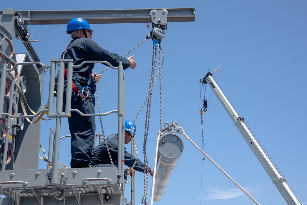 USS San Diego loads ordinance