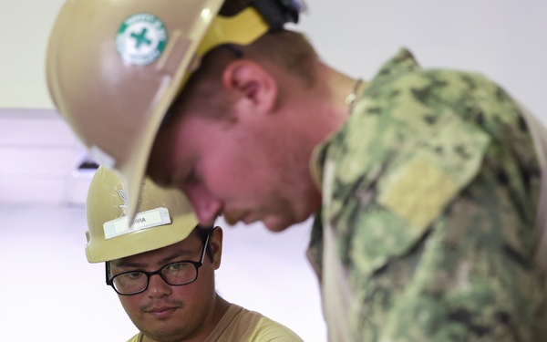 Continuing Promise 2024 Seabees renovate a building at Centro Reintegra in Colón, Panama