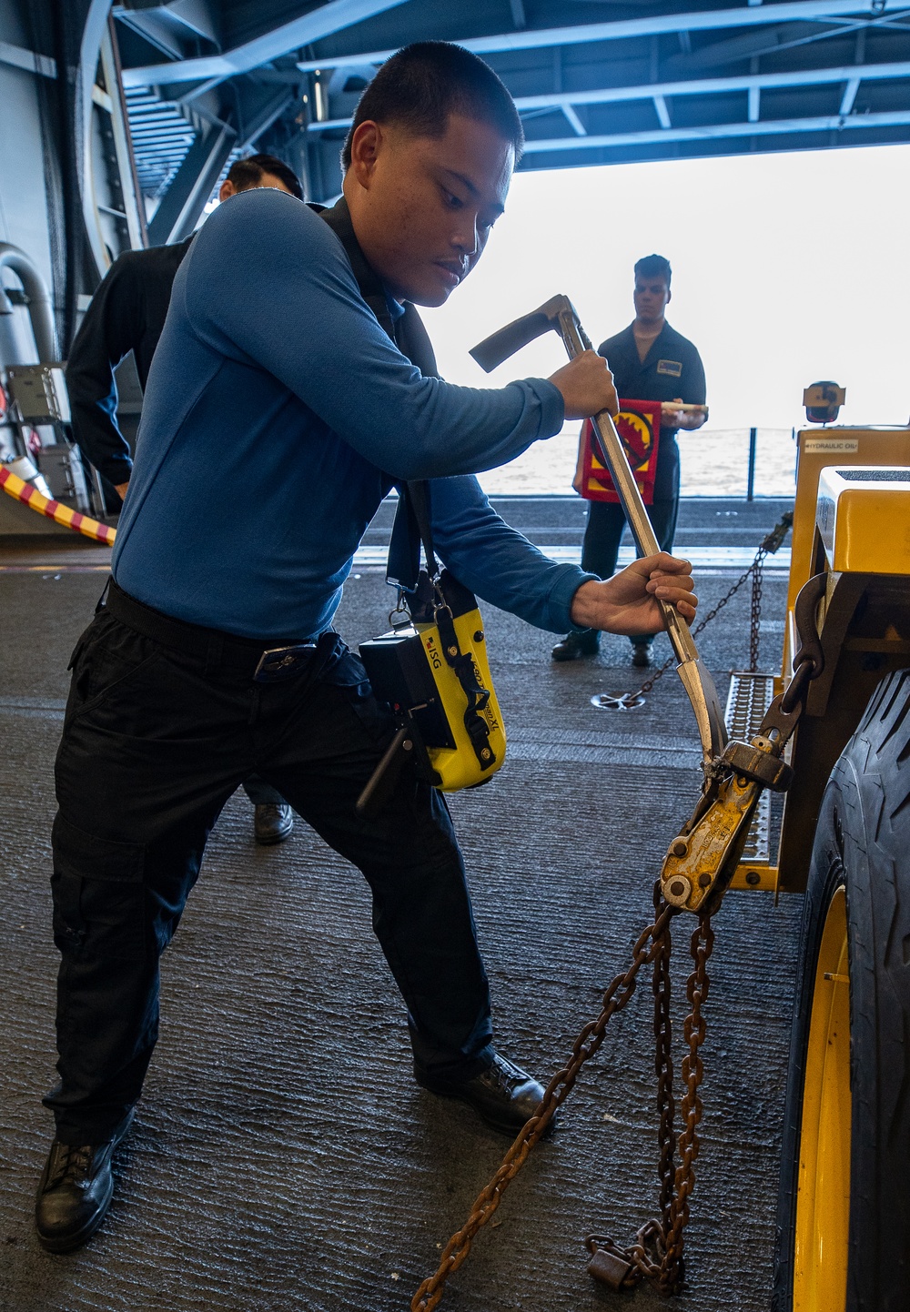 USS George Washington Sailors conduct training in the hangar bay