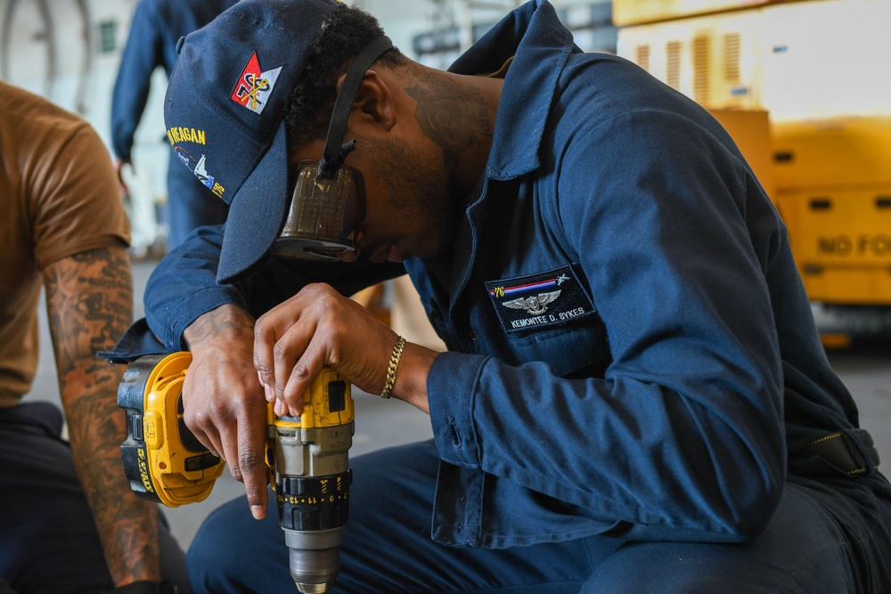 USS Ronald Reagan (CVN 76) Sailors conduct routine maintenance