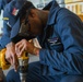 USS Ronald Reagan (CVN 76) Sailors conduct routine maintenance