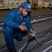 USS Ronald Reagan (CVN 76) Sailors inspect equipment