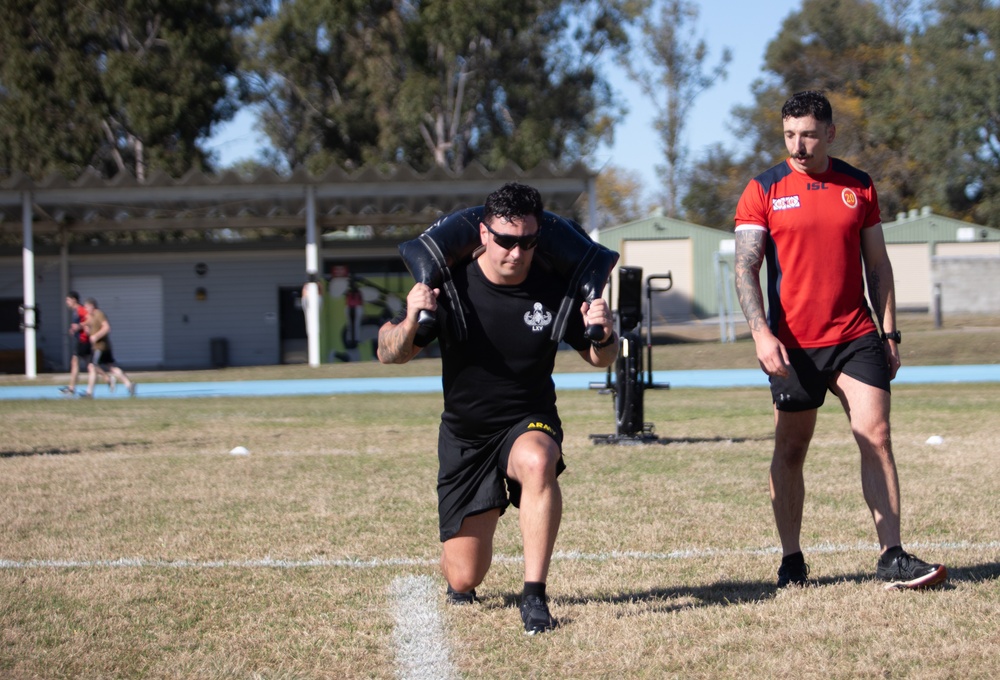 Joint combined service members participate in PT event during Render Safe 2024