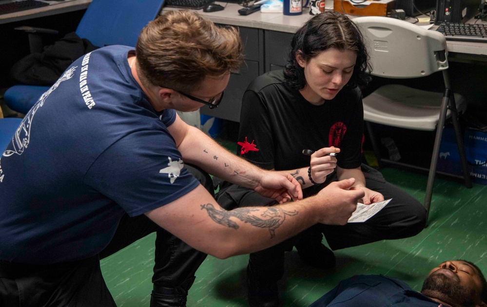 Sailors participate in medical drill aboard USS America (LHA 6)