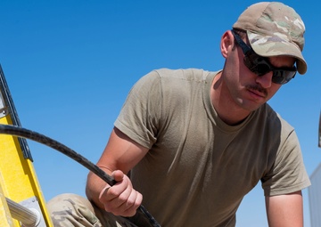 332 AEW Airmen install fiber optic internet