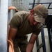 332 AEW Airmen install fiber optic internet