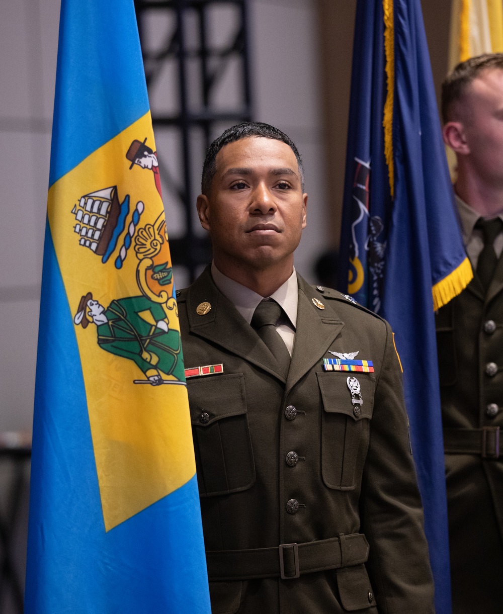 Sgt. Jamel Howard Holds the Delaware State Flag During the EAGNUS All States Banquet