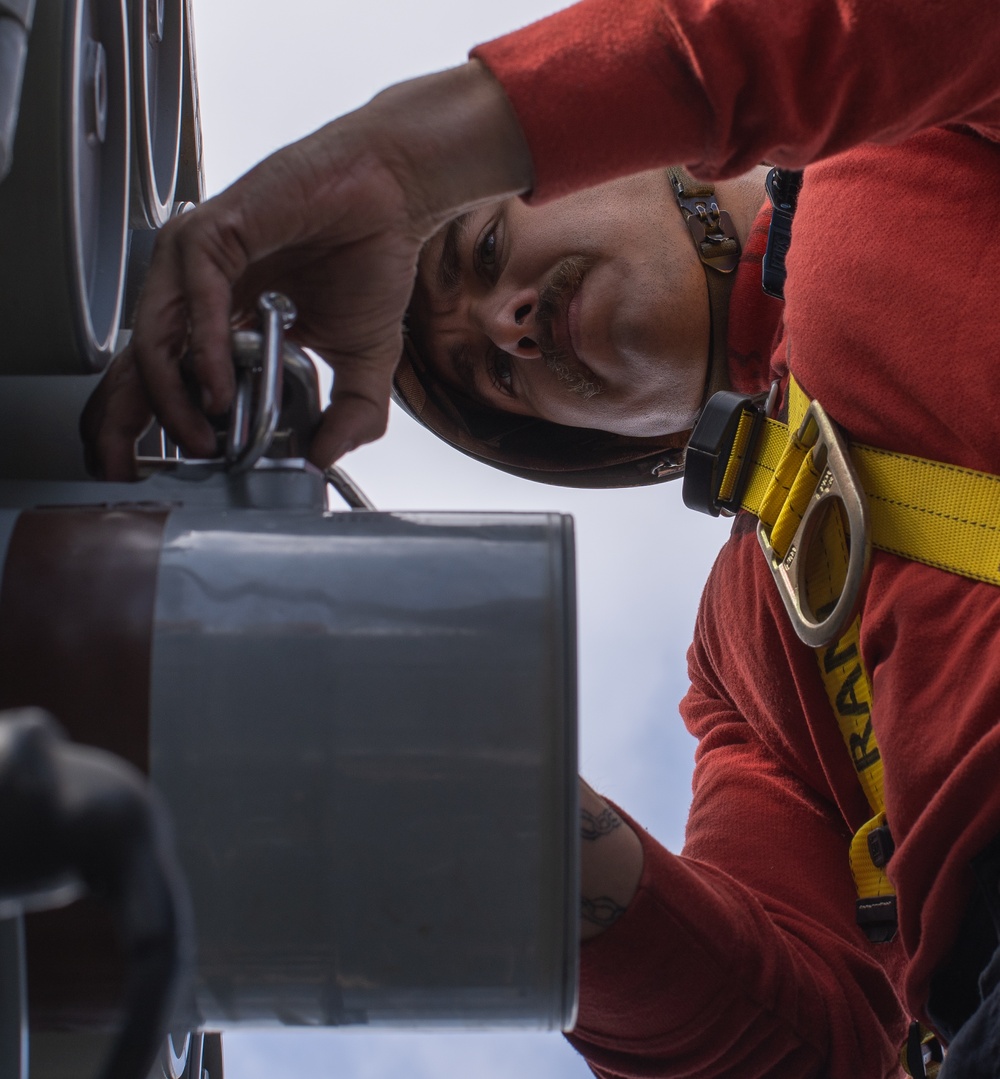USS George Washington Sailors download rolling airframe missiles