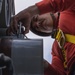 USS George Washington Sailors download rolling airframe missiles