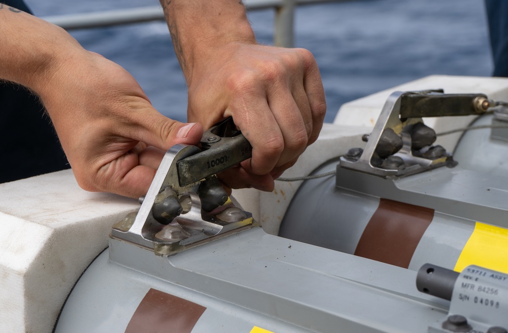 USS George Washington Sailors download rolling airframe missiles
