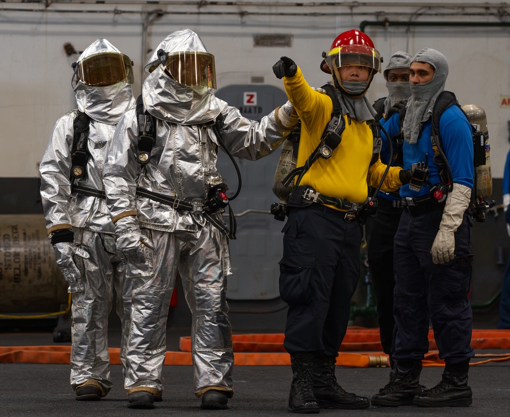 USS George Washington Sailors conduct aircraft firefighting training.