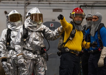 USS George Washington Sailors conduct aircraft firefighting training.