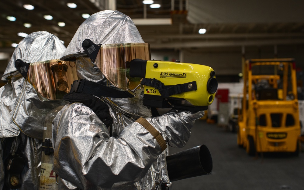 USS George Washington Sailors conduct aircraft firefighting training.