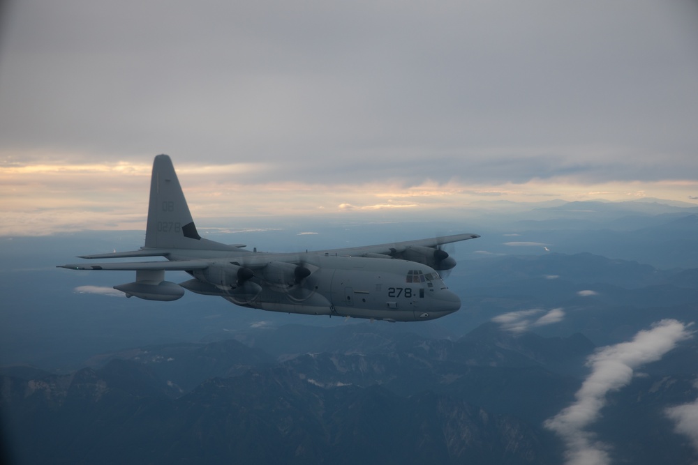 VMGR-152 Marine promotes in-flight