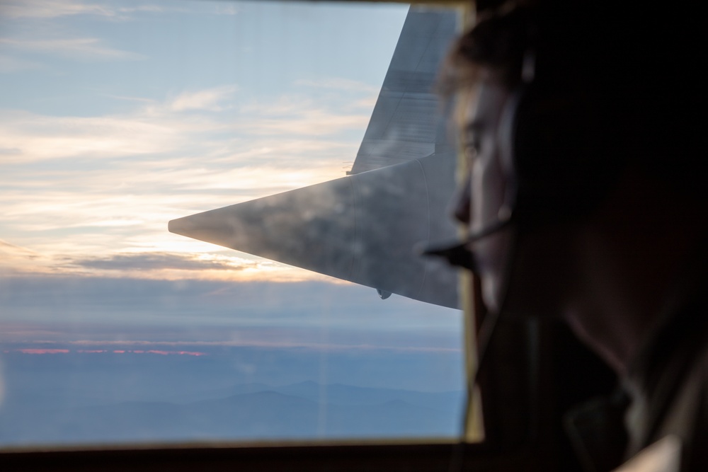 VMGR-152 Marine promotes in-flight