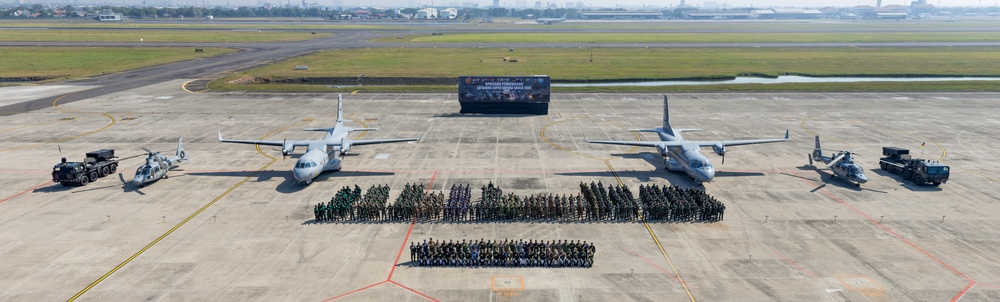 Multinational service members come together for group photo during Super Garuda Shield 24 opening ceremony