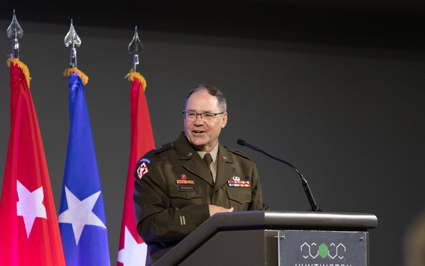 Major General Paul Rogers Gives Opening Remarks at the JLC