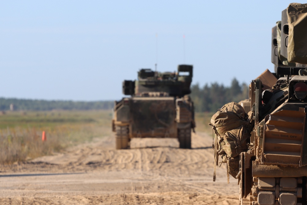 Soldiers stationed at Bemowo Piskie Training Area qualify during M2 Bradley Fighting Vehicle Gunnery Table IV