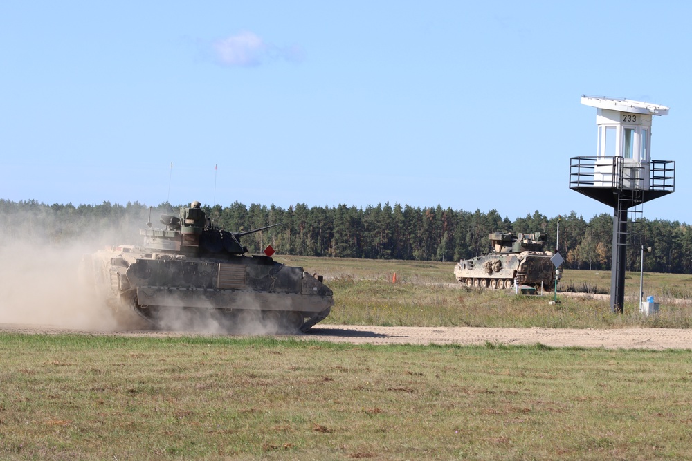 Soldiers stationed at Bemowo Piskie Training Area qualify during M2 Bradley Fighting Vehicle Gunnery Table IV