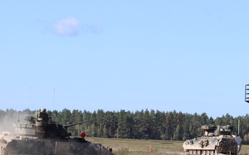 Soldiers stationed at Bemowo Piskie Training Area qualify during M2 Bradley Fighting Vehicle Gunnery Table IV