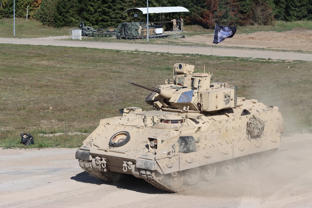 Soldiers stationed at Bemowo Piskie Training Area qualify during M2 Bradley Fighting Vehicle Gunnery Table IV